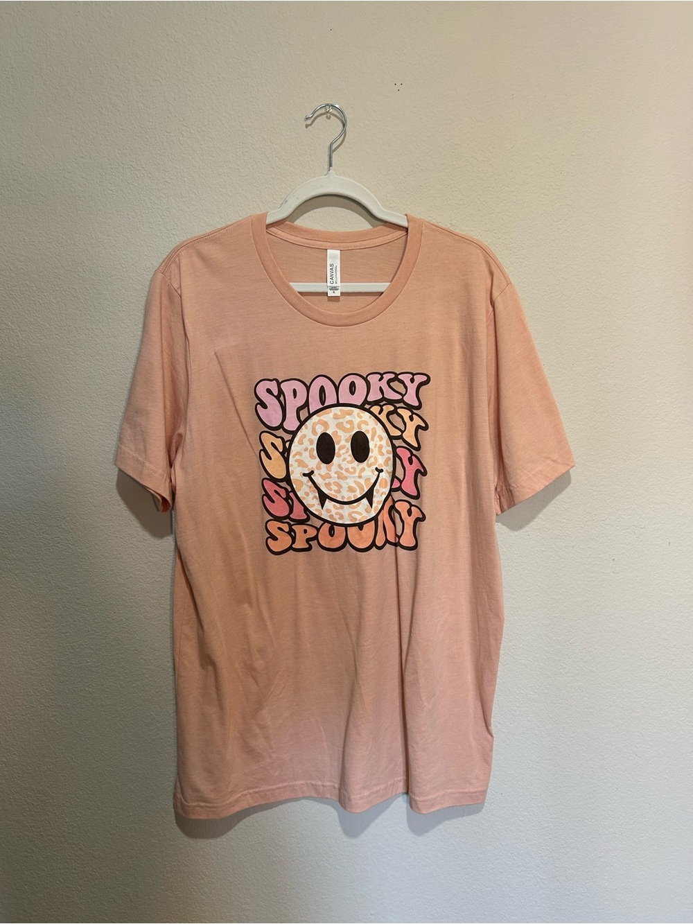 Spooky Smile Graphic Tee - Peach Pink